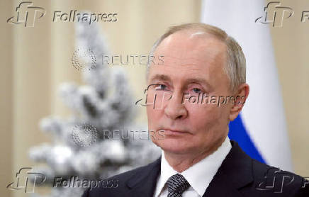 Russian President Putin attends a press conference in Leningrad region