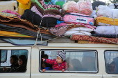 Displaced Palestinians wait to be allowed to return to their homes in northern Gaza, in the central Gaza Strip