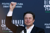 FILE PHOTO: Elon Musk attends Italy's PM Meloni's right-wing party's political festival Atreju, in Rome