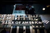 FILE PHOTO: Bank of America logo is seen on the entrance to a Bank of America financial center in New York