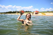 People find relief from the summer heat at Penrith Beach in Australia