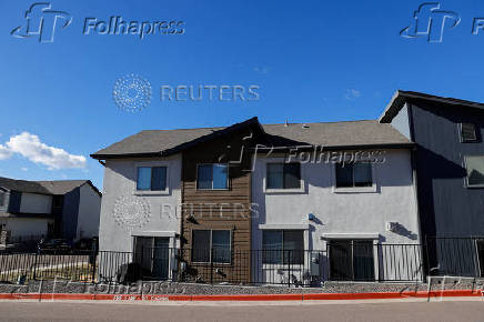 Investigators search a townhouse, in relation to the explosion in Las Vegas of a Tesla Cybertruck