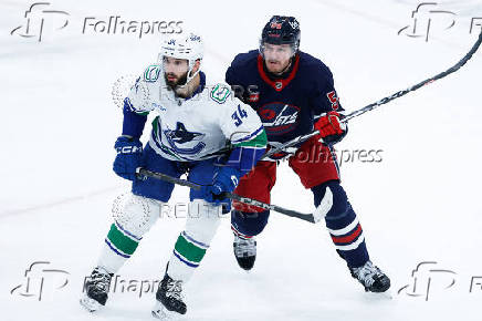 NHL: Vancouver Canucks at Winnipeg Jets