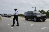 The motorcade carrying U.S. President-elect Trump departs Palm Beach