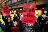 Harrods staff strike for Christmas bonus and better conditions.