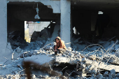 Site of an Israeli strike on a house, amid the Israel-Hamas conflict, in Al Maghazi refugee camp in the central Gaza Strip