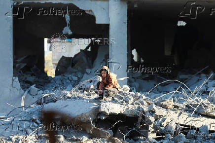 Site of an Israeli strike on a house, amid the Israel-Hamas conflict, in Al Maghazi refugee camp in the central Gaza Strip