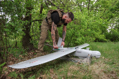 Ukrainian serviceman prepares a reconnaissance UAV for flying in a front line in Donetsk region