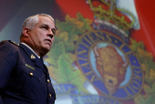 RCMP Commissioner Duheme takes part in a press conference in Ottawa