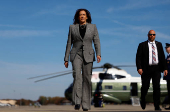 Democratic presidential nominee U.S. Vice President Kamala Harris boards Air Force Two to depart for Michigan