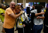 Maccabi Tel Aviv soccer fans arrive at the Ben Gurion International Airport