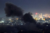 Smoke billows over Beirut's southern suburbs, after an Israeli strike