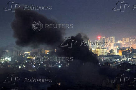 Smoke billows over Beirut's southern suburbs, after an Israeli strike