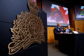 RCMP Commissioner Duheme takes part in a press conference in Ottawa