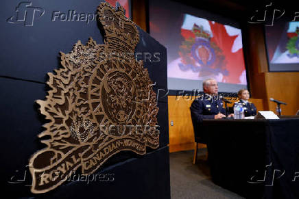 RCMP Commissioner Duheme takes part in a press conference in Ottawa