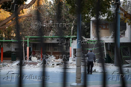 Scenes from a damaged site after a projectile fired from Yemen was intercepted, in Ramat Gan