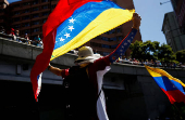 Venezuela's opposition supporters gather ahead of President Maduro's inauguration, in Caracas