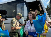 Ukrainian POWs are seen after a swap at an unknown location in Ukraine