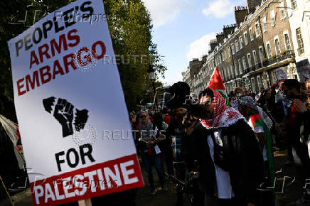 People demonstrate in support of Palestinians in Gaza, in London