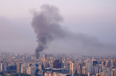 Smoke billows over Beirut's southern suburbs, amid the ongoing hostilities between Hezbollah and Israeli forces