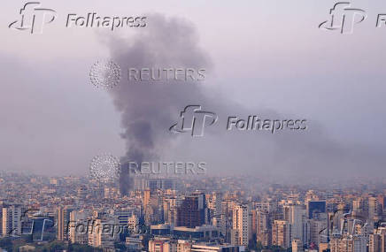 Smoke billows over Beirut's southern suburbs, amid the ongoing hostilities between Hezbollah and Israeli forces