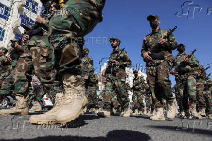 Houthi mobilization trainees parade in Sanaa