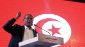 FILE PHOTO: Former Tunisian President Moncef Marzouki speaks at a meeting to launch his new political party in Tunis