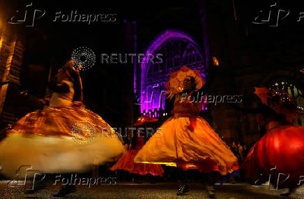 The 12 Days of Christmas Parade passes Chester Cathedral