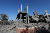 Aftermath of an Israeli strike on a house, in Deir Al-Balah in the central Gaza Strip