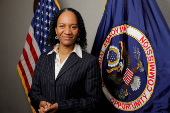 FILE PHOTO: Charlotte Burrows, chair of The United States Equal Employment Opportunity Commission (EEOC) poses for a photo at their headquarters in Washington, D.C.