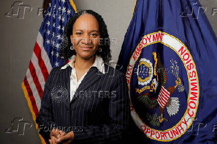 FILE PHOTO: Charlotte Burrows, chair of The United States Equal Employment Opportunity Commission (EEOC) poses for a photo at their headquarters in Washington, D.C.