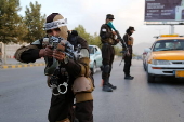 Afghans Taliban conduct checks on people and vehicles at checkpoints in Kabul