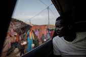The Wider Image: African migrant disaster survivor haunted by weeks lost at sea
