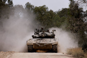 A tank manoeuvres near the Israel-Gaza border