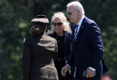 FILE PHOTO: U.S. President Joe Biden afirst lady Jill Biden arrive at Fort Lesley J. McNair en route to the White House