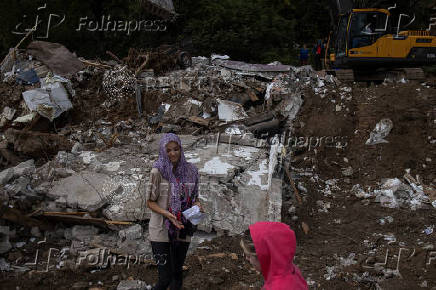 Aftermath of deadly floods and landslides in a village of Trusina