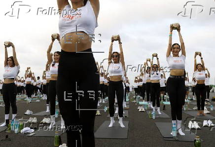 Brew Yoga exercise at Thailand's airport runway