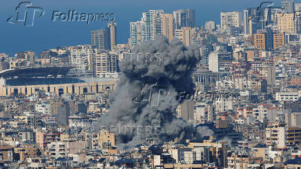 Smoke billows over Beirut's southern suburbs, after an Israeli strike