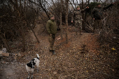 Servicemen are seen at their positions near a frontline near the town of Chasiv Yar