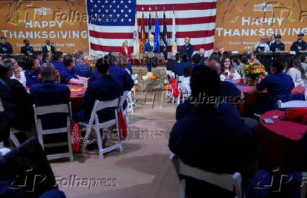 U.S. President Biden attends a dinner with U.S. service members and their families ahead of Thanksgiving at U.S. Coast Guard Sector New York on Staten Island