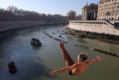 Traditional New Year's diving into the Tiber River in Rome