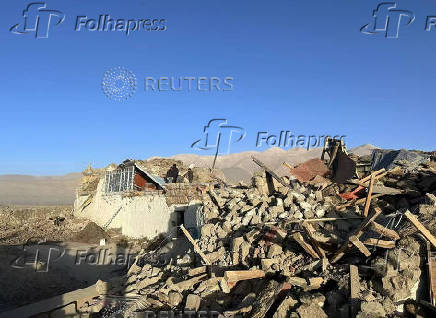 Damaged houses are pictured after an earthquake in Shigatse