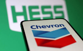 FILE PHOTO: Illustration shows Chevron and Hess logos