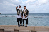 People gather to celebrate Eid wearing traditional Libyan outfits in Benghazi