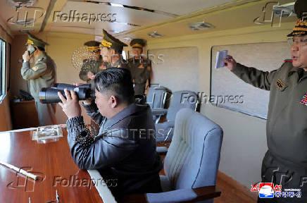 Photo shows North Korean leader Kim Jong Un supervise a missile test