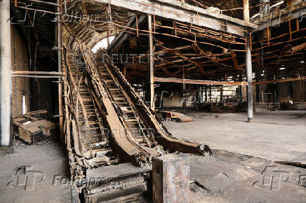 A view of a burned and destroyed escalator in the departure hall of Khartoum Airport, in Khartoum