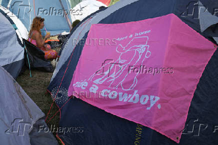 Revellers attend Glastonbury Festival at Worthy Farm in Pilton, Somerset, Britain