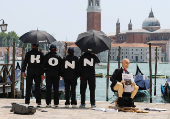 Bezos mannequins displayed in parody installation around Venice ahead of his wedding