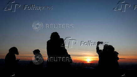 FILE PHOTO: People enjoy the sunset in Ankara