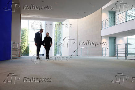 German Chancellor Merz and Ukrainian President Volodymyr Zelenskiy attend a press conference, in Berlin